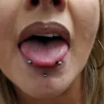 Tongue and chin piercings